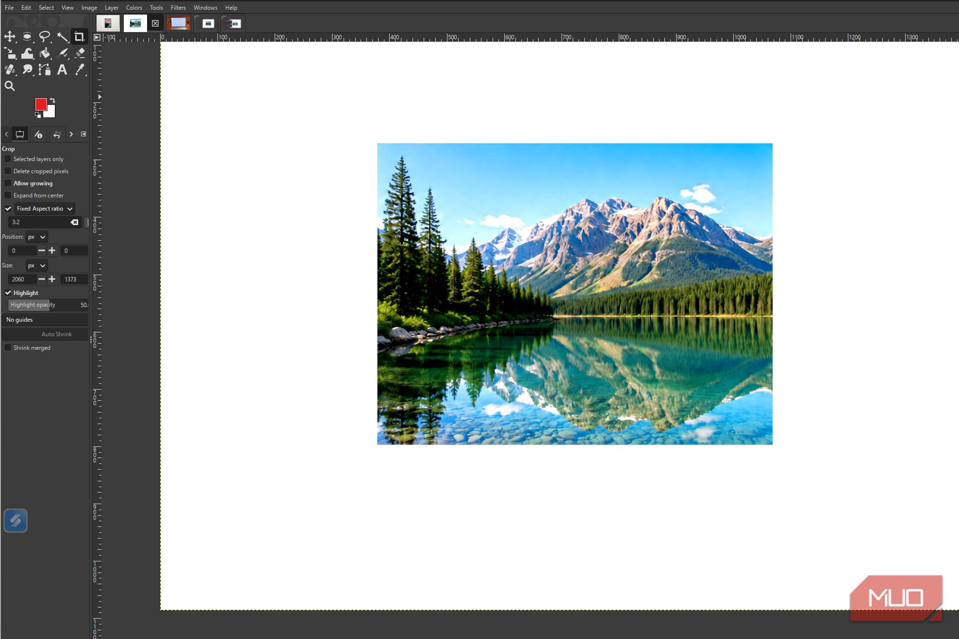 GIMP showing the finished mountain lake photo after the Levels adjustments have been applied