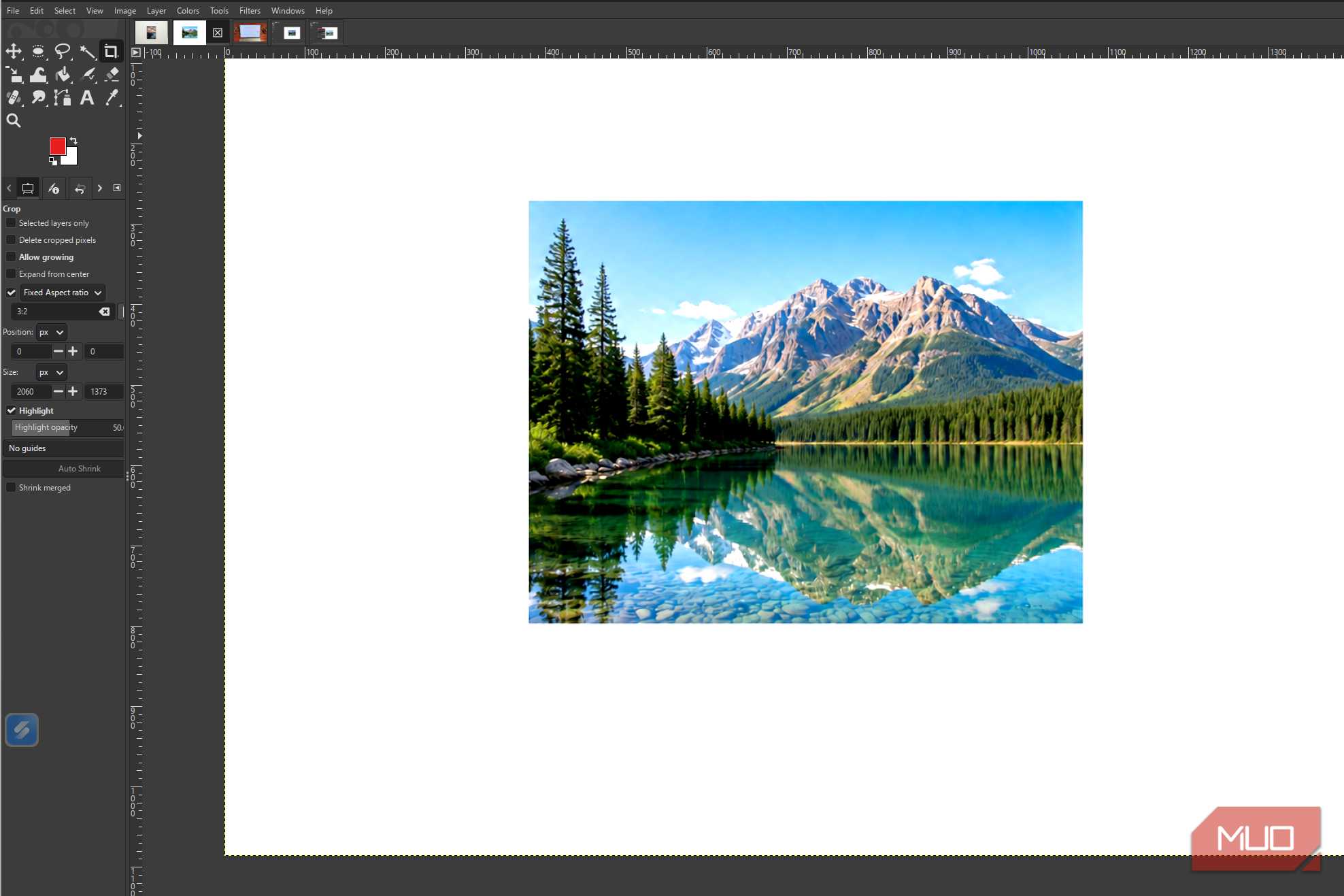 GIMP showing the finished mountain lake photo after the Levels adjustments have been applied