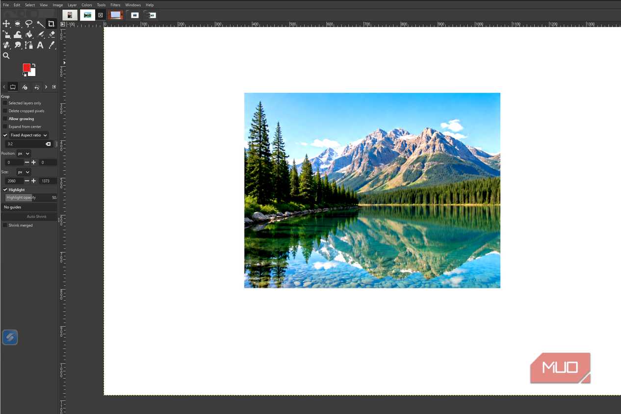 GIMP showing the finished mountain lake photo after the Levels adjustments have been applied