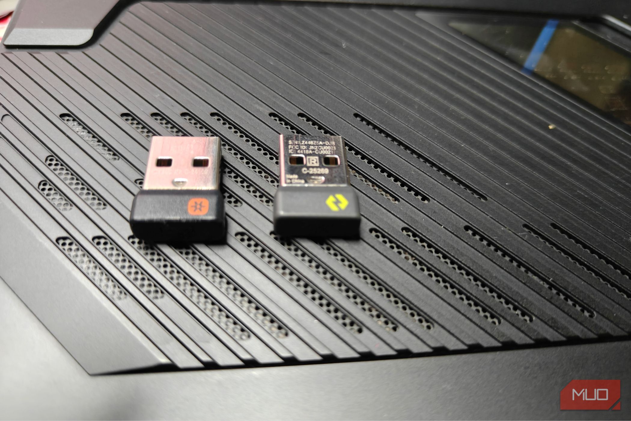 Comparing two Logitech dongles