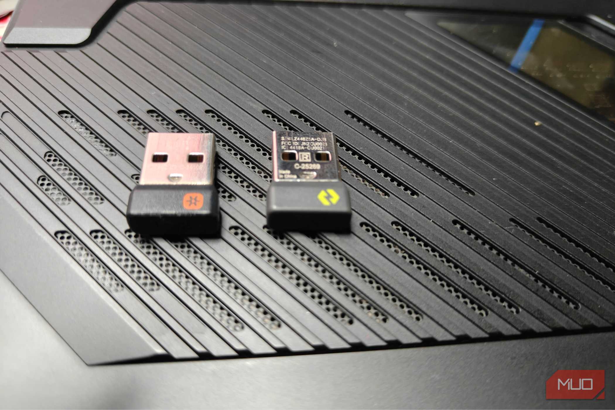 Comparing two Logitech dongles