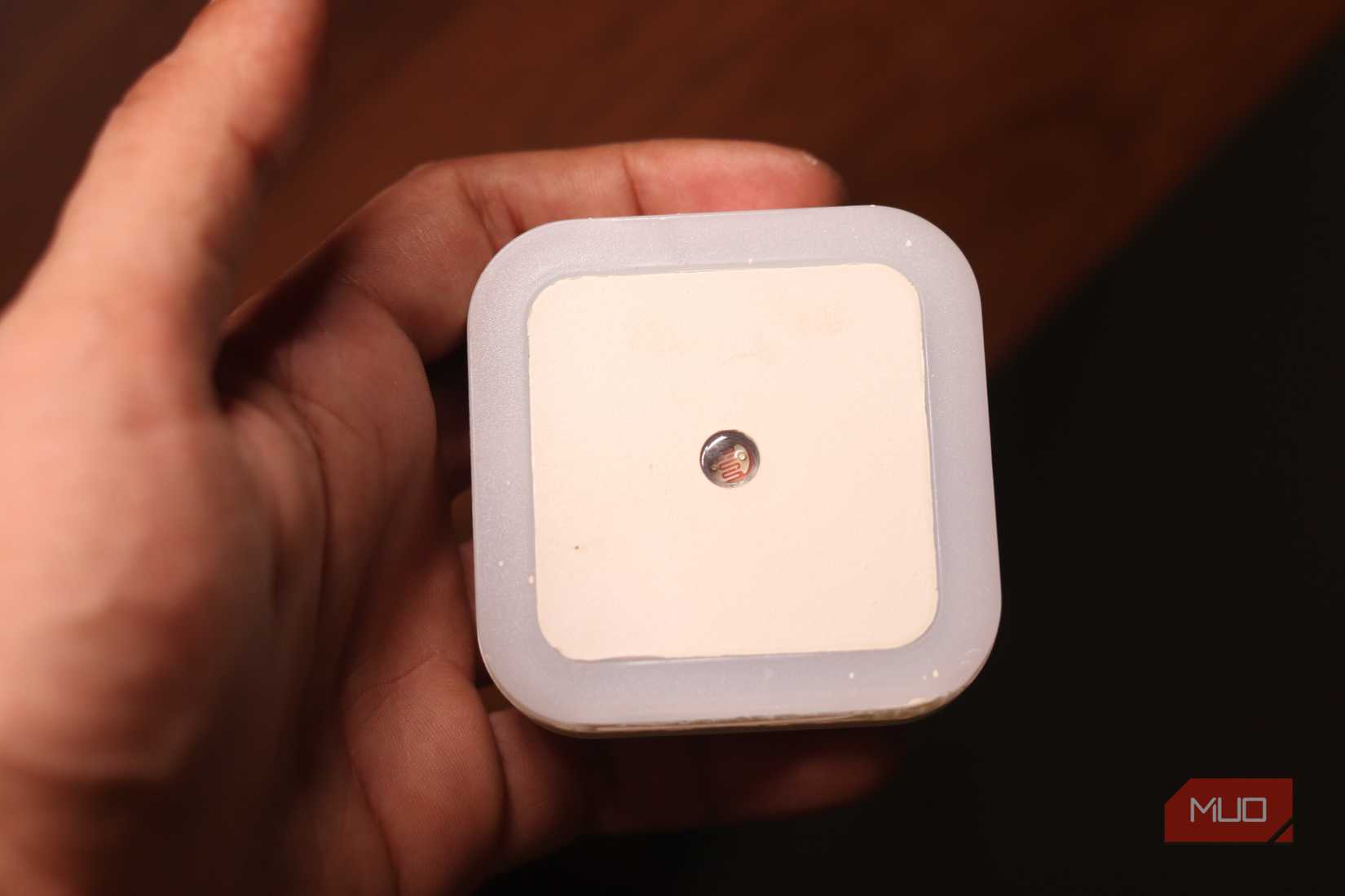 Photoresistor in a light enclosure.