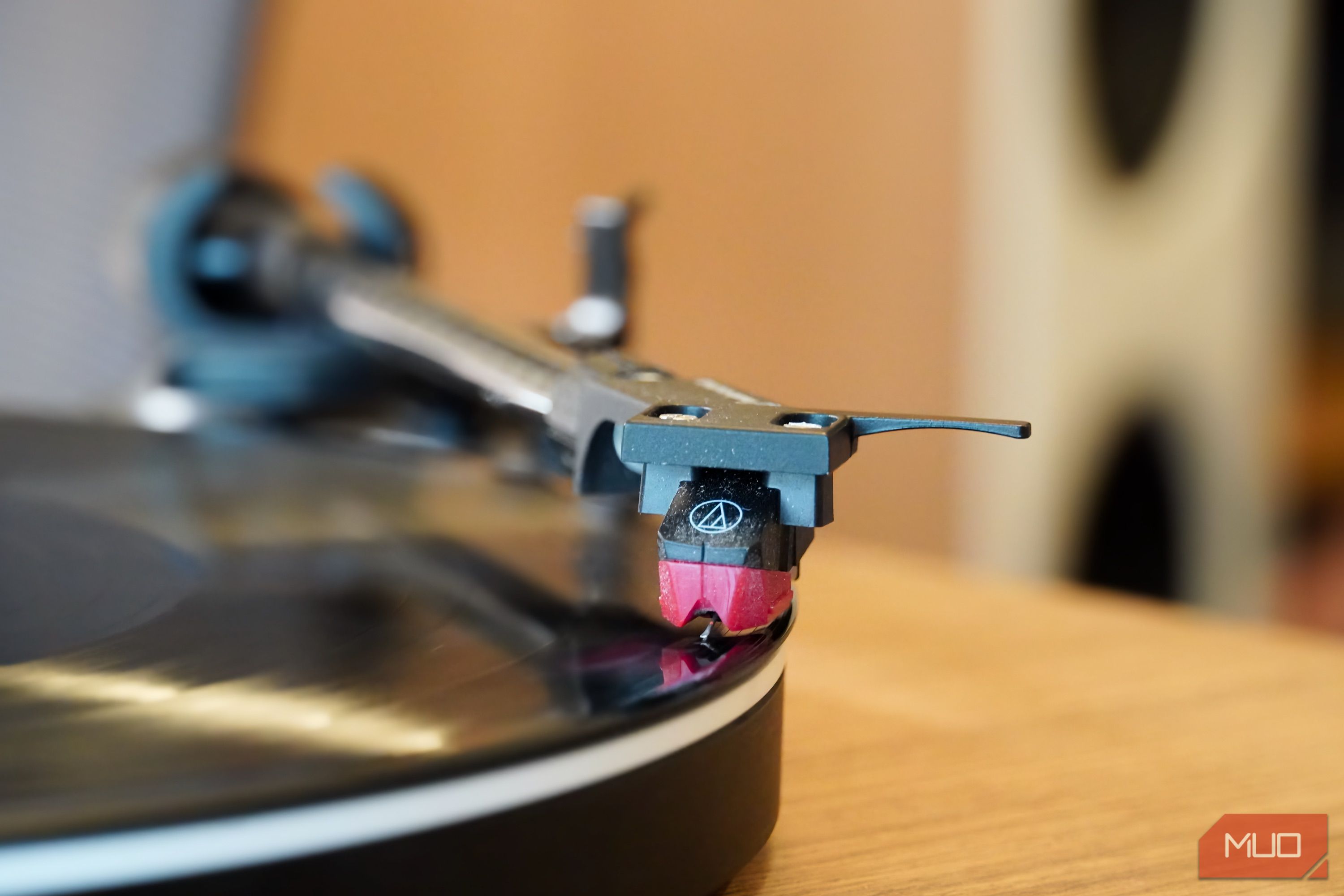 The turntable stylus on a record.