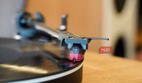The turntable stylus on a record.