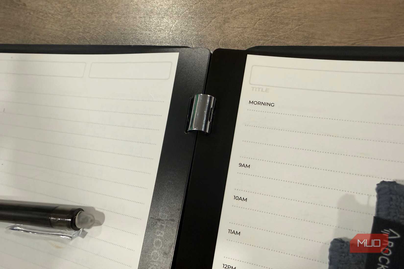 rocketbook pro 2.0 close-up of center binding clips and daily planner page