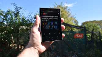samsung galaxy z fold 8 folded front view in hand