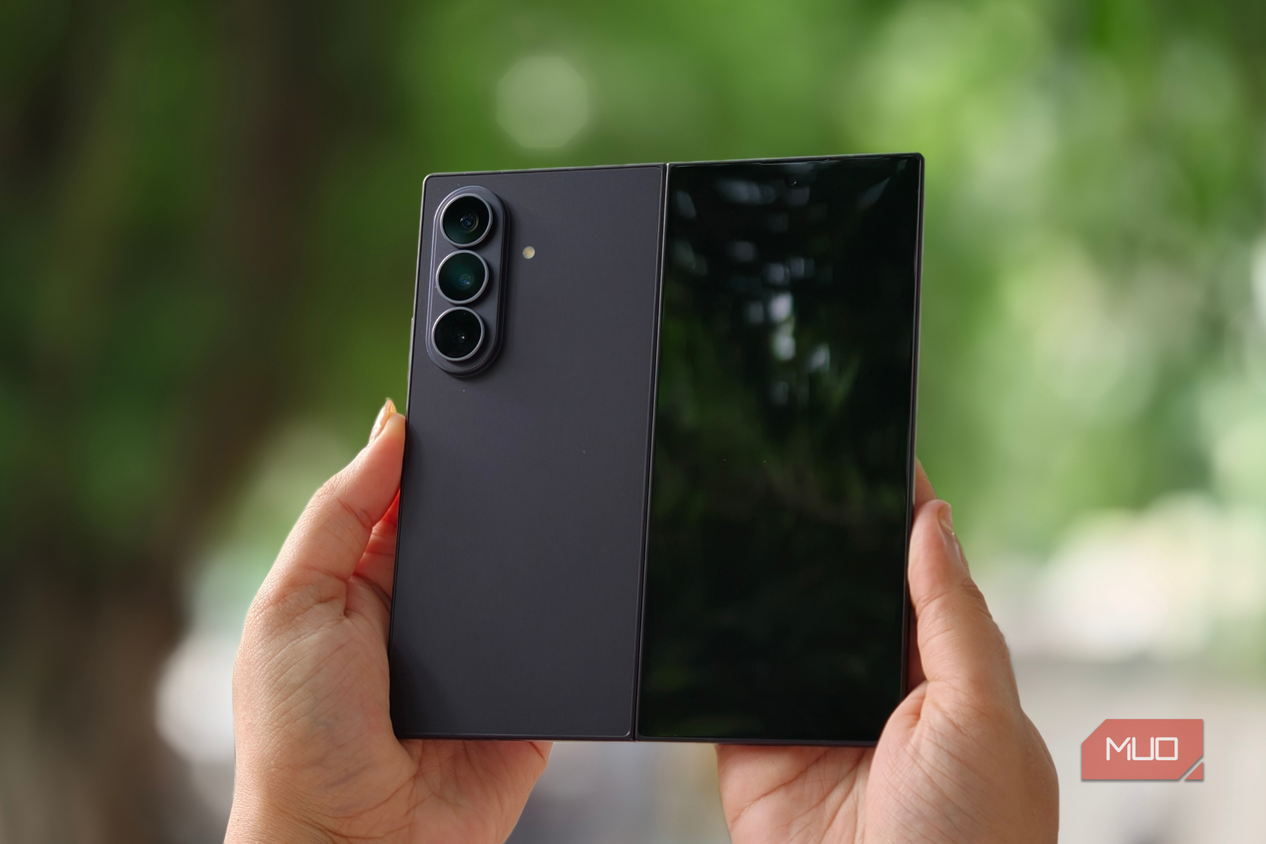 Samsung Galaxy Z Fold 8 Ultra with the cover display visible in a person's hand