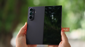 Samsung Galaxy Z Fold 8 Ultra with the cover display visible in a person's hand