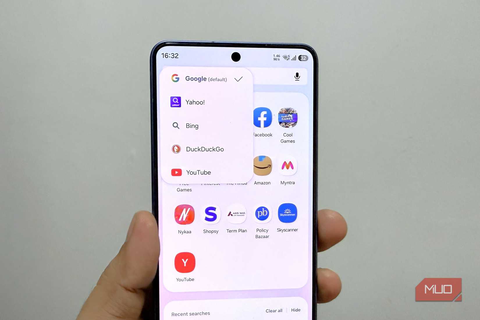 Samsung phone in hand showing Samsung Internet search engine options