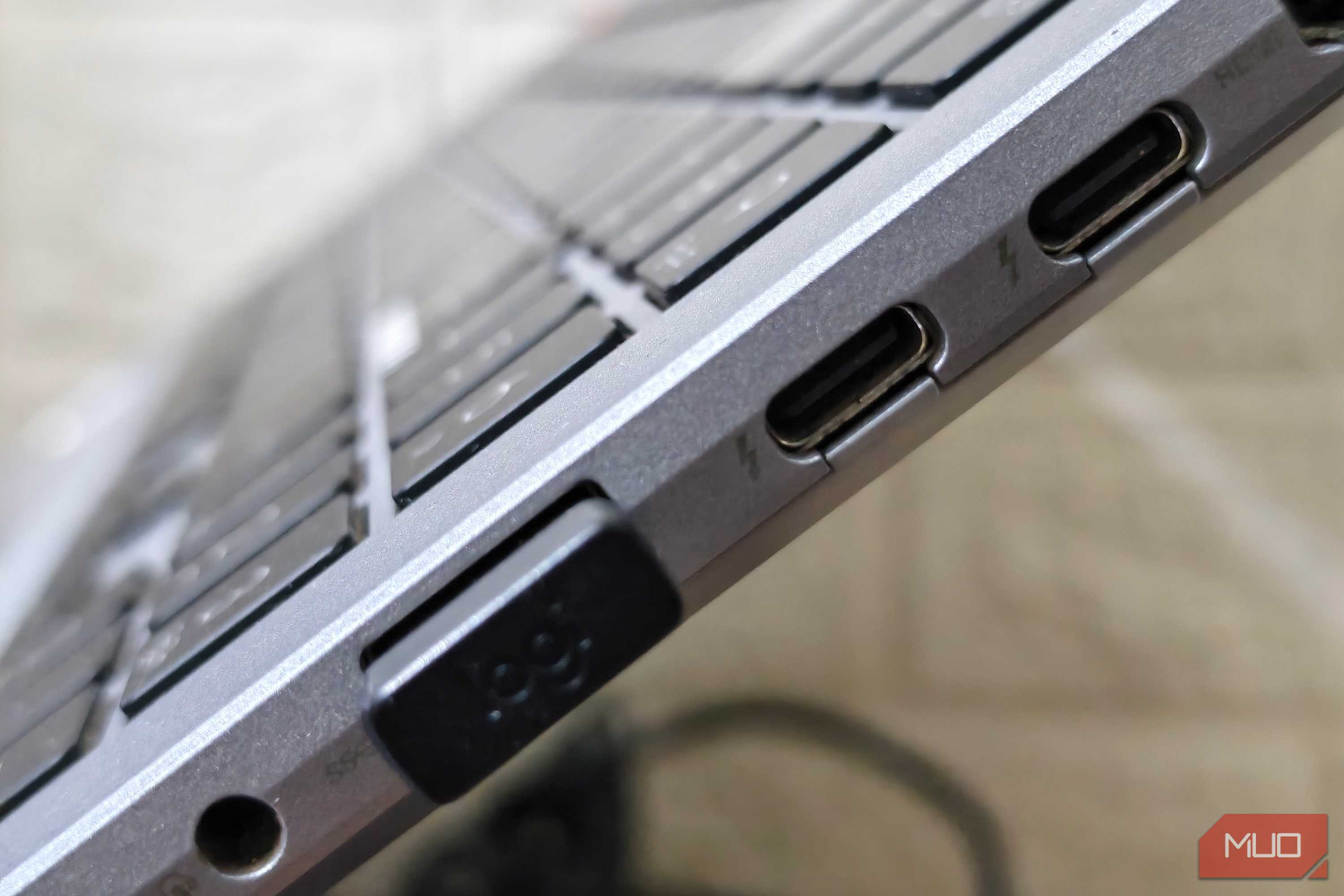 Side view showing two USB-C and one USB-A port
