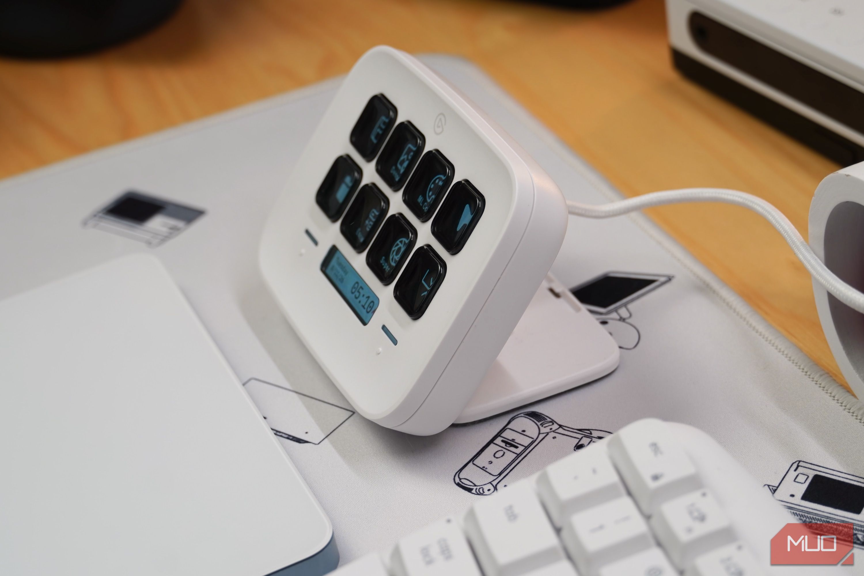An angled view of the Stream Deck Neo on a desk.