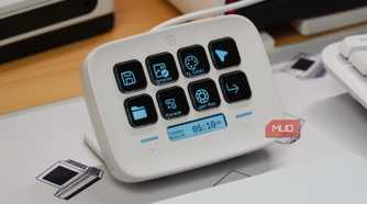 The buttons on a white Stream Deck Neo.