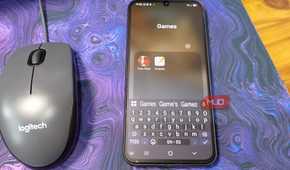Samsung Galaxy folder being created and names Games, with similar game apps grouped inside