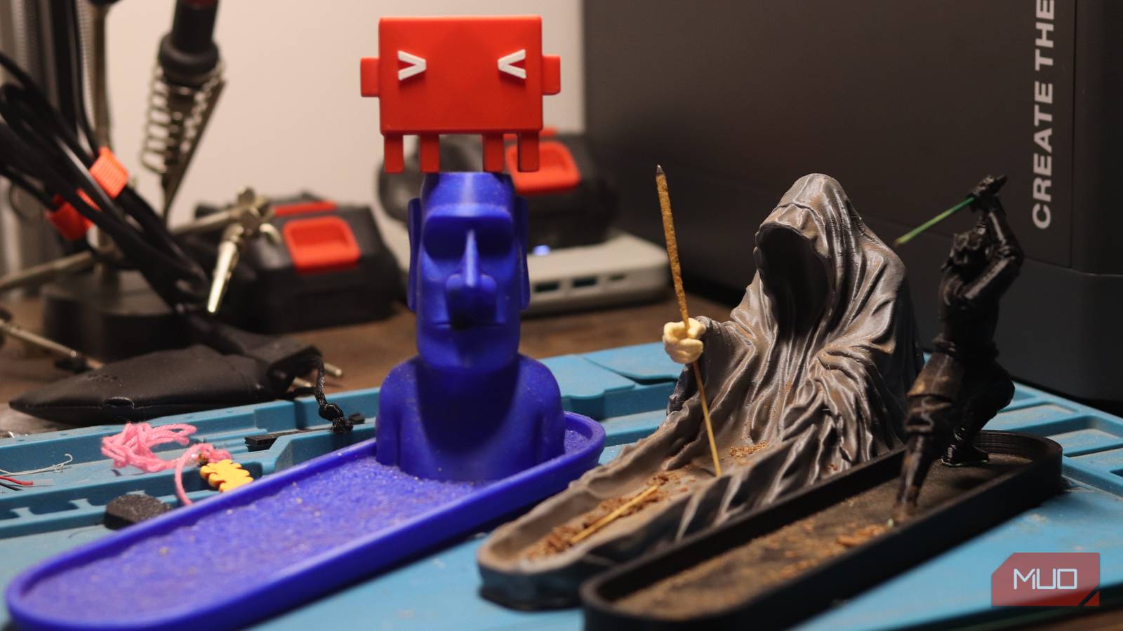 3D printed incense holders sitting together.