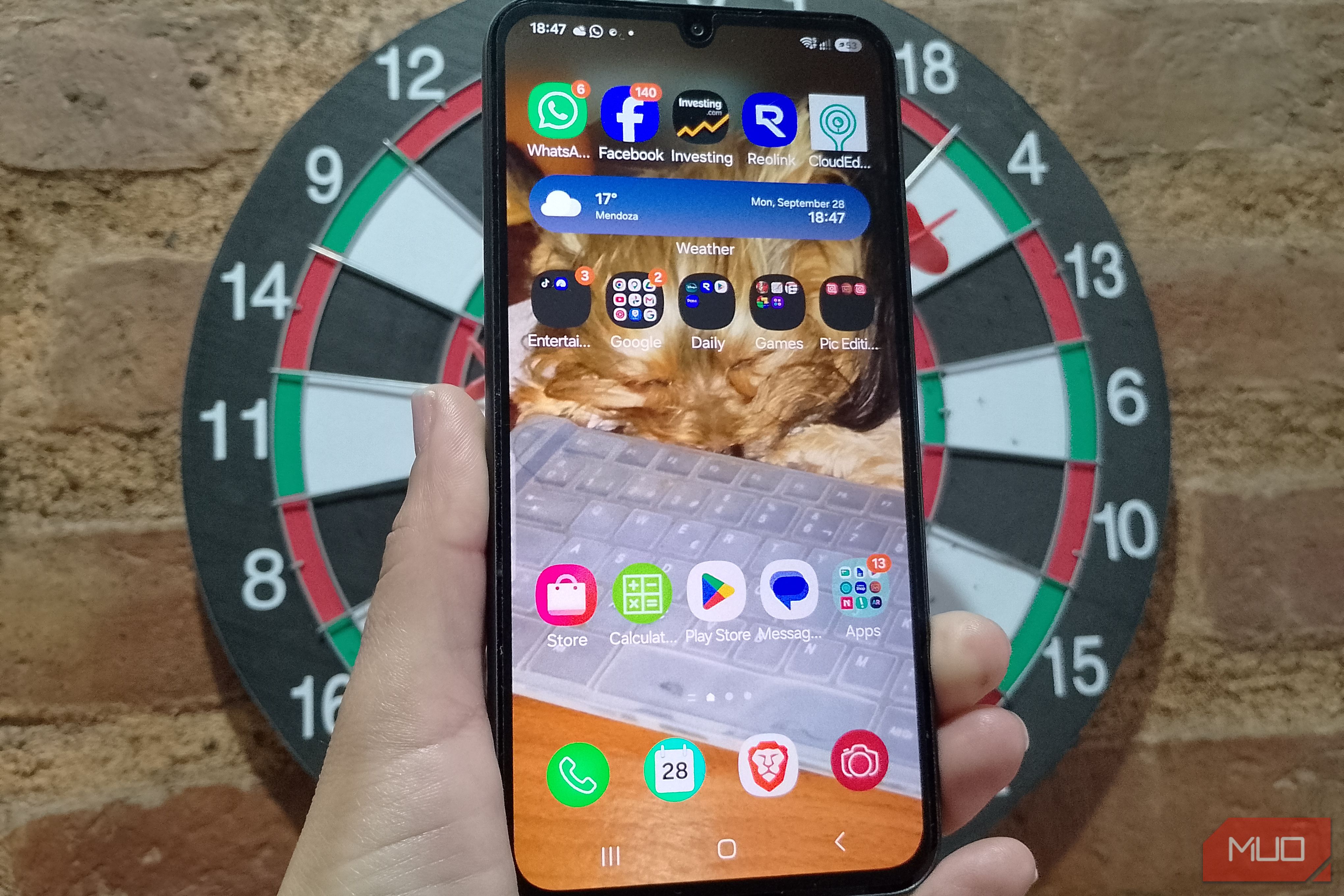 Samsung Galaxy home screen with apps organized into labeled folders, showing a cleaner and less cluttered layout