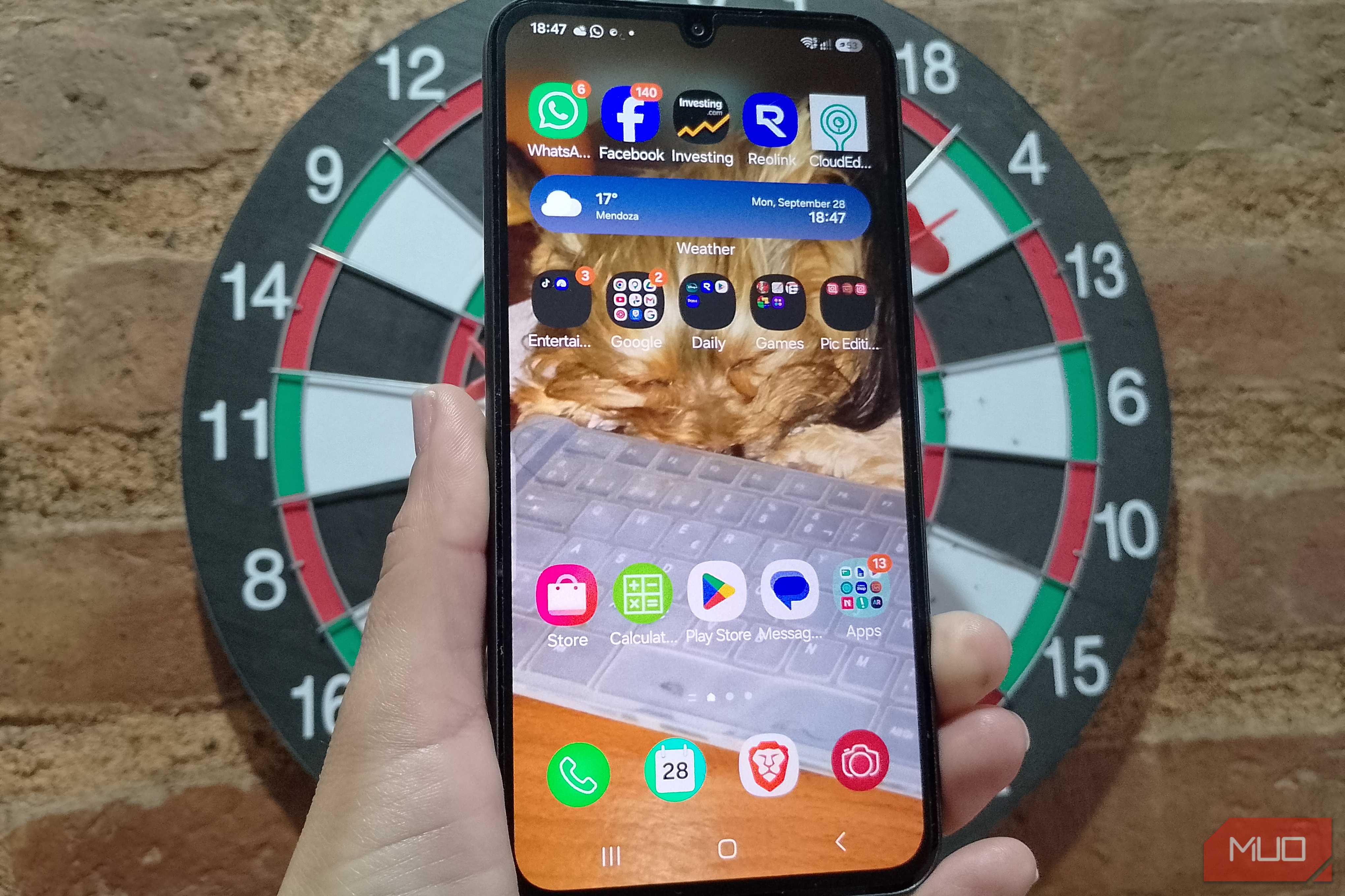 Samsung Galaxy home screen with apps organized into labeled folders, showing a cleaner and less cluttered layout