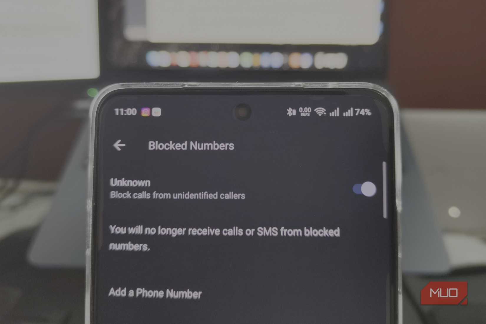 an Android smartphone showing the option to block unknown numbers