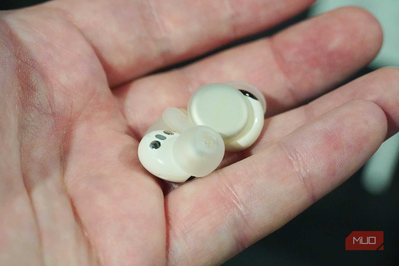 The Soundcore Sleep 4 Pro earbuds in the hand.