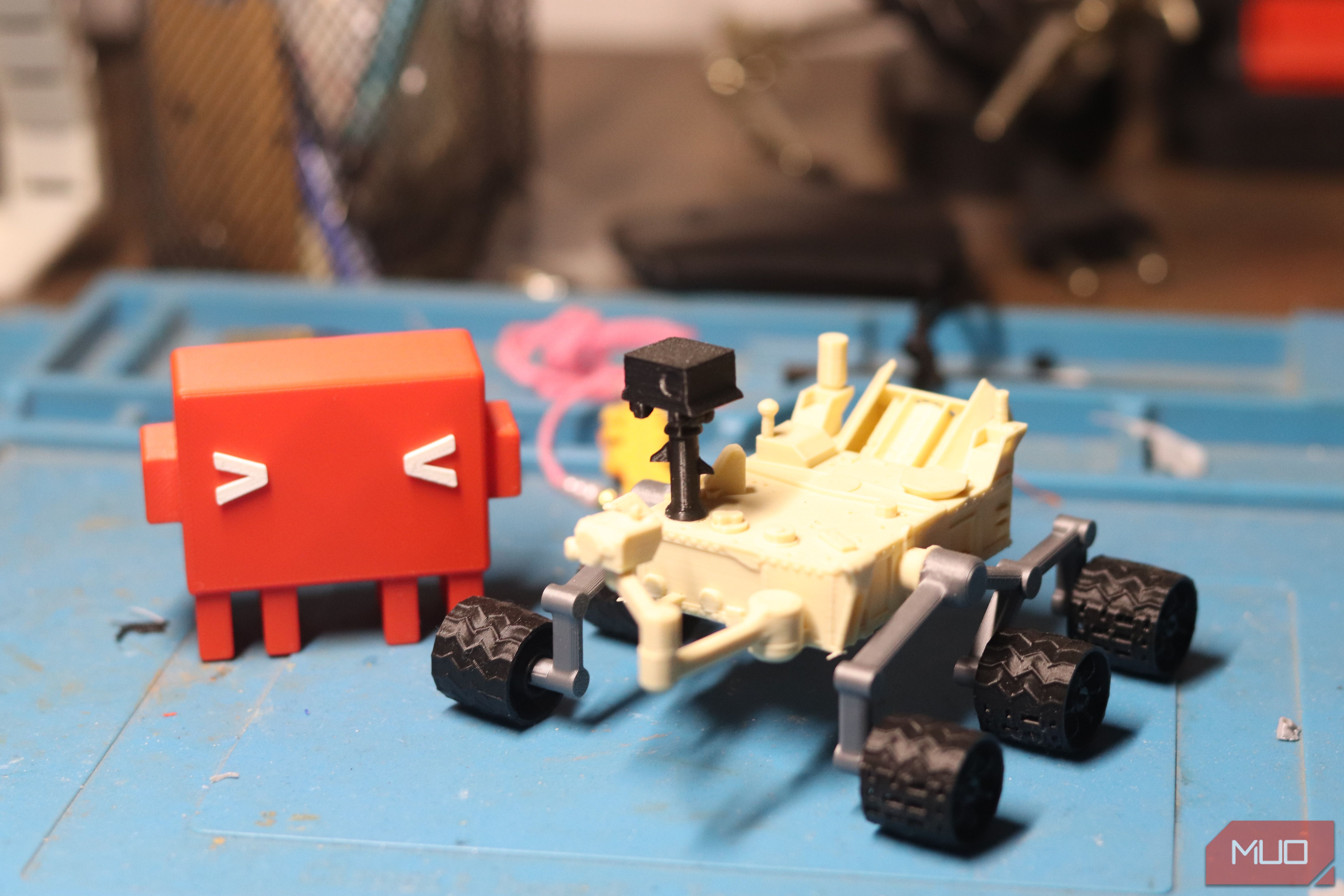 Claude Code Mascot and NASA rover 3D printed.