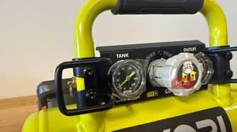 Close-up of Ryobi compressor gauges and pressure regulator