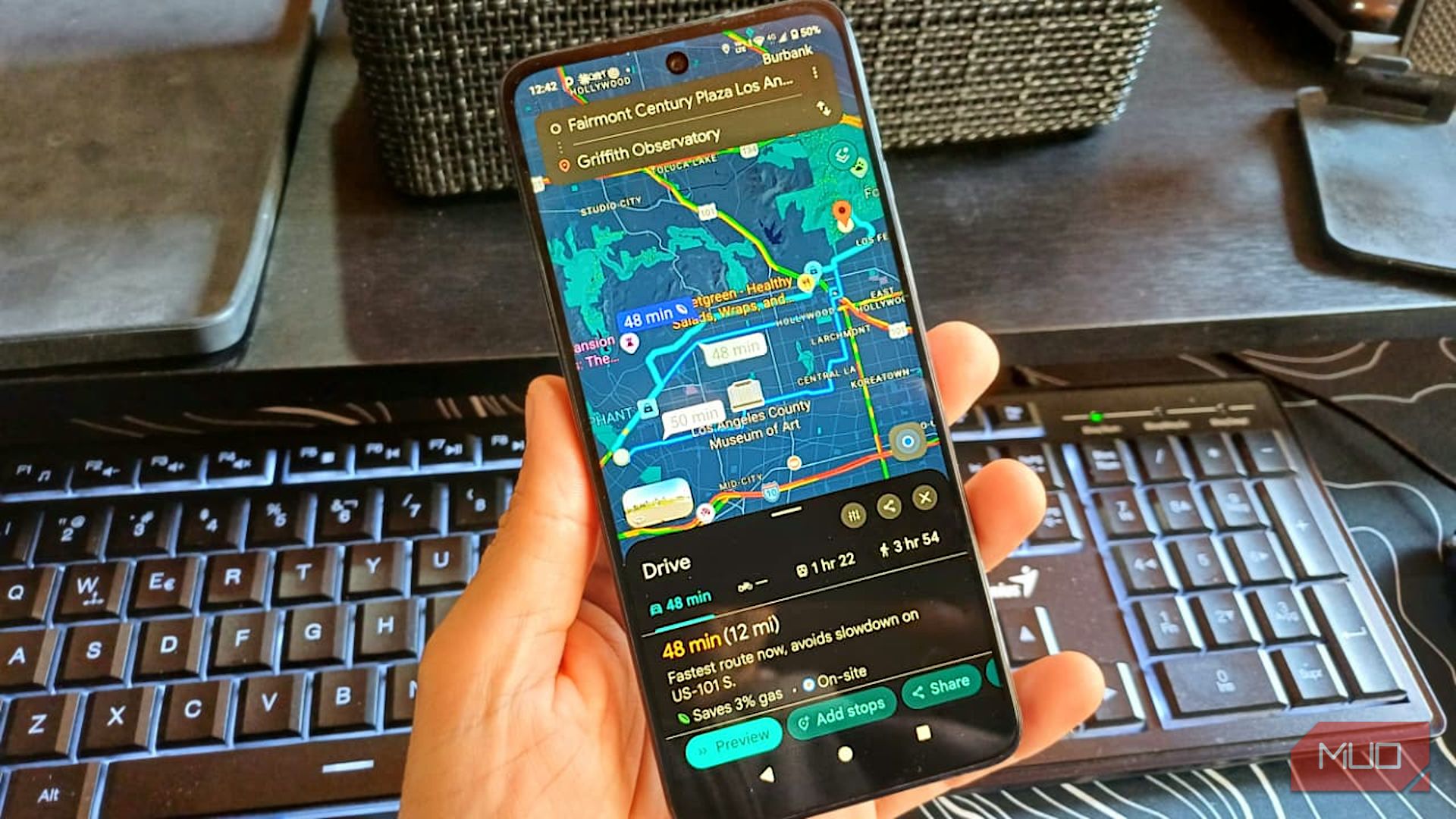 Phone showing a Google Maps route with an estimate 3% gas savings