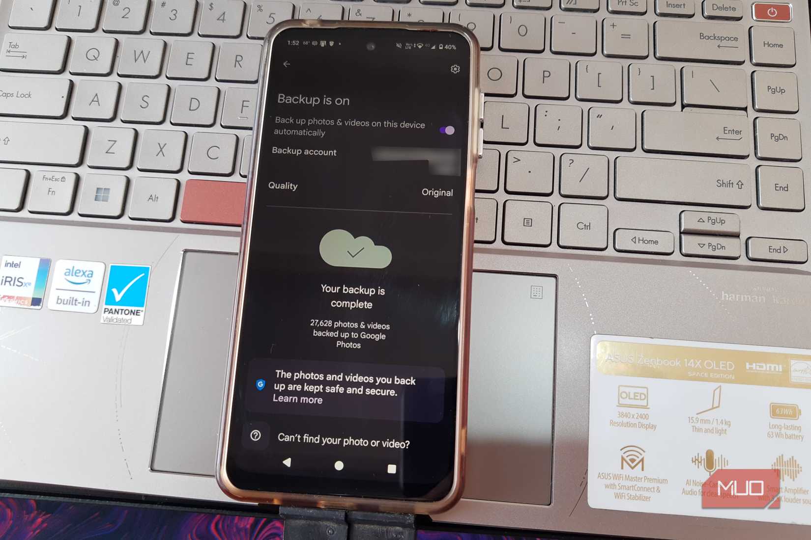 Android phoen showing Google Photos with backup turned on and the backup complete message
