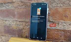 Android phone showing Google Photos at 100% after freeing up 9.73 GB of storage