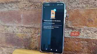 Android phone showing Google Photos at 100% after freeing up 9.73 GB of storage