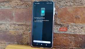 Android phone showing Google Photos confirming that 9.73 GB of storage was freed