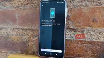 Android phone showing Google Photos confirming that 9.73 GB of storage was freed