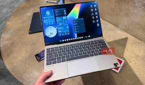 The Dell XPS Googlebook in the hand.