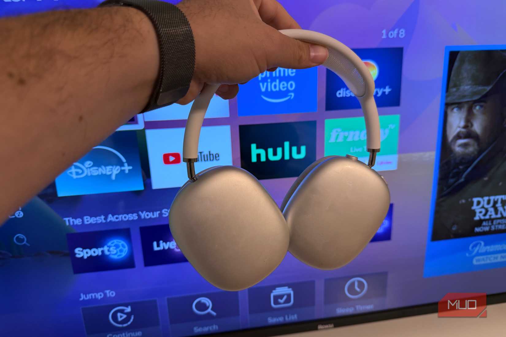 headphones in front of a roku tv