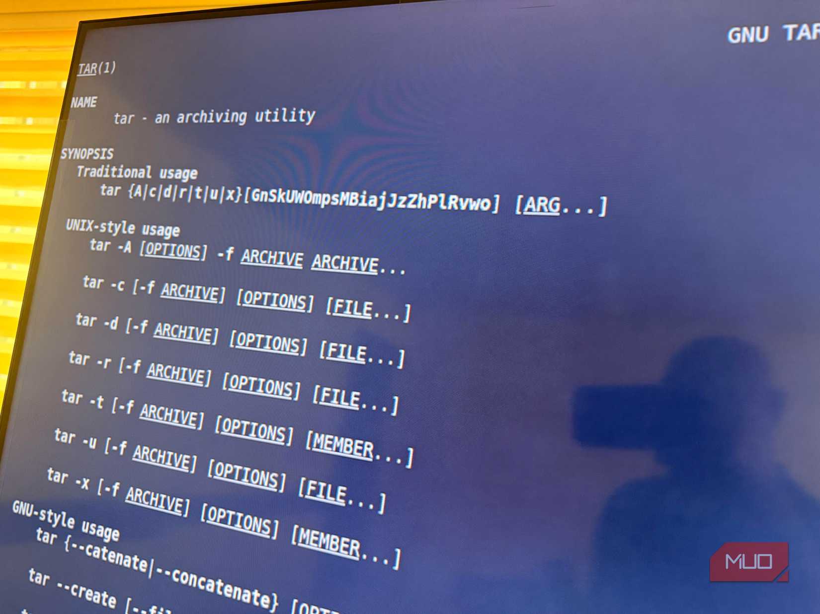 man tar command output on Linux-1