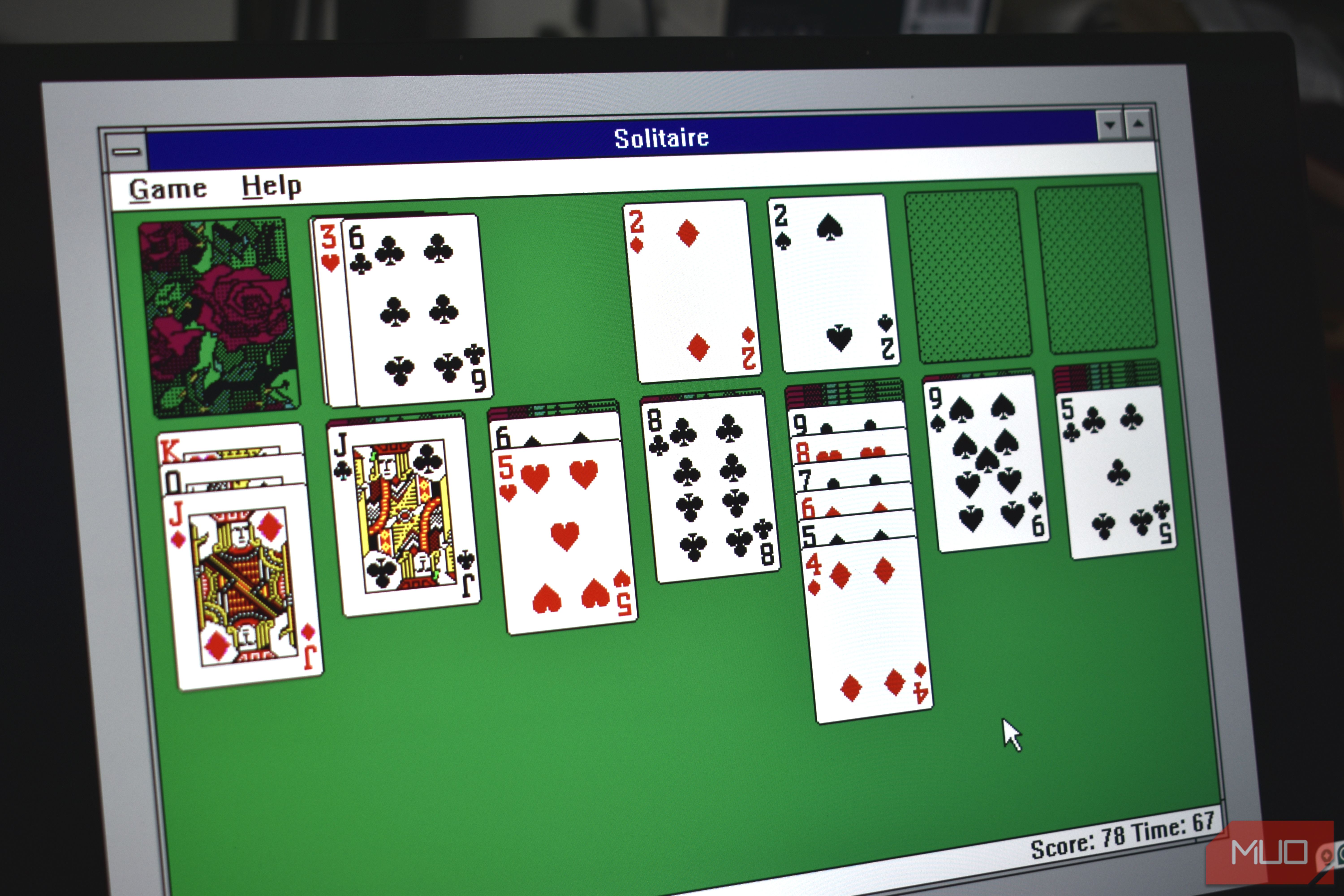 original solitaire game played in windows 3.0 on laptop screen.