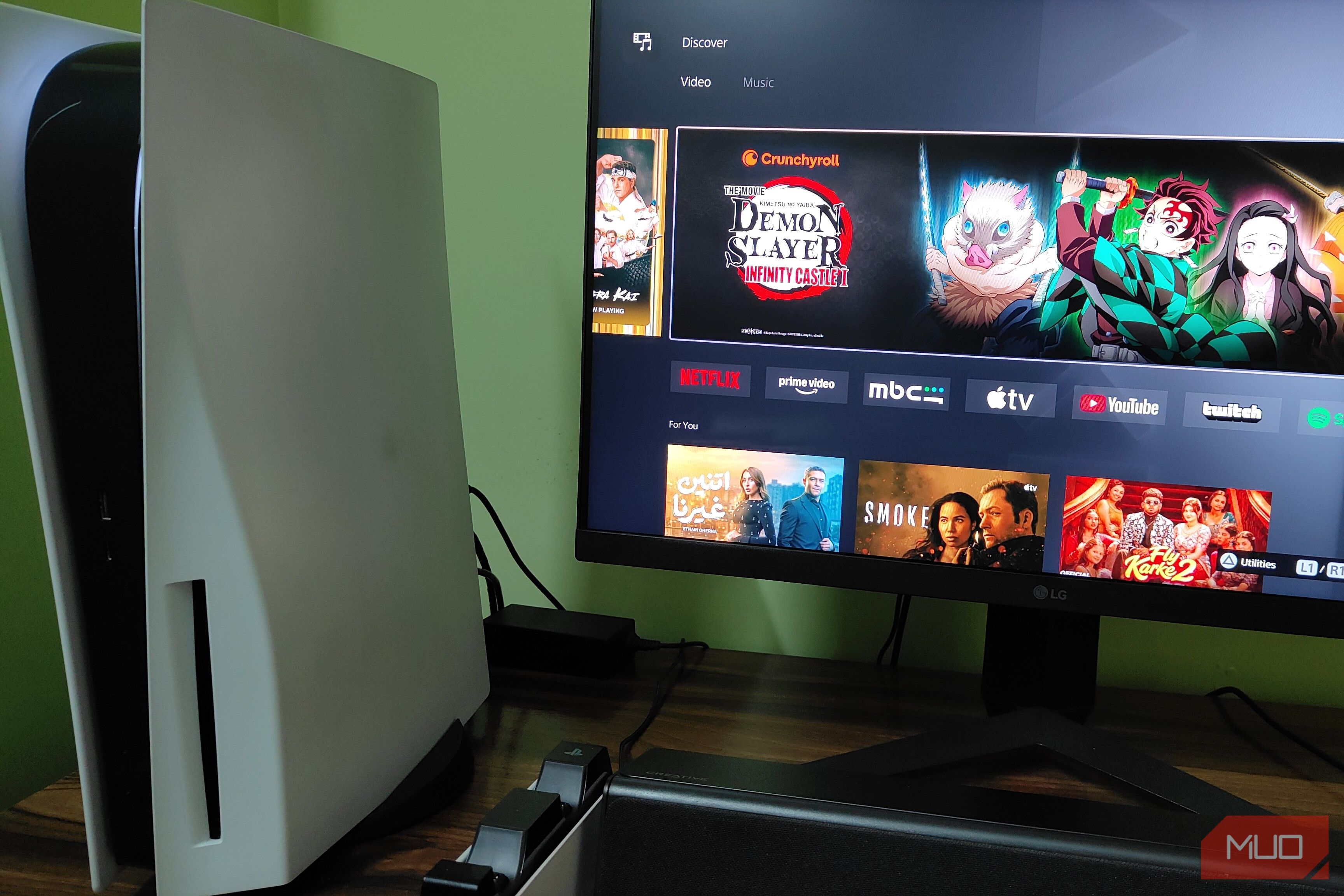 PS5 and the media center tab showcasing popular shows