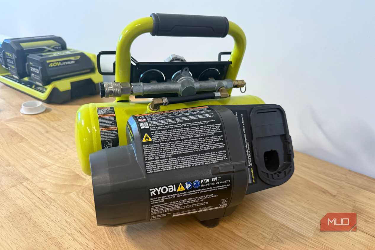 Ryobi cordless compressor rear view showing motor and label