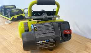 Ryobi cordless compressor rear view showing motor and label