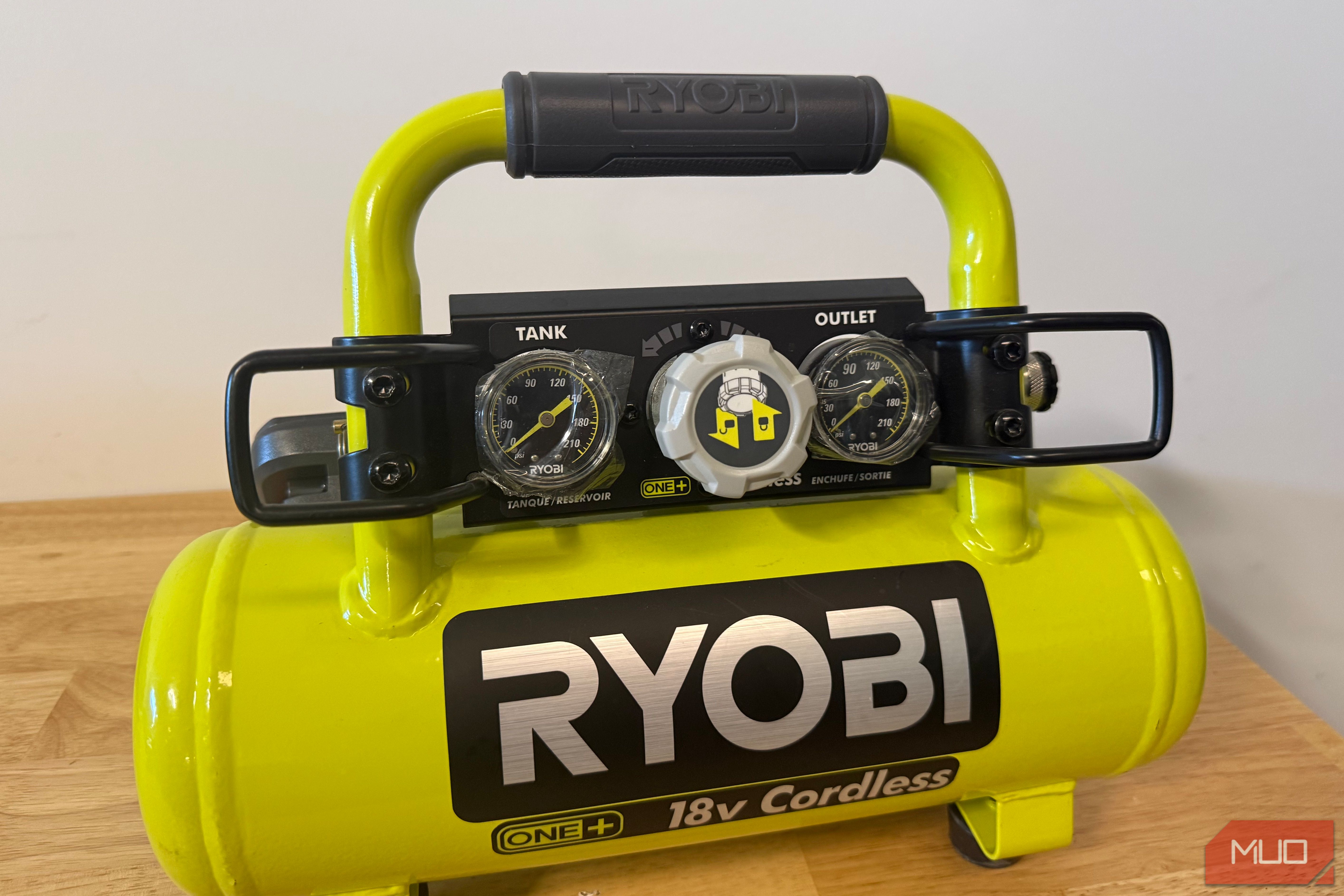 Ryobi cordless compressor with tank and outlet pressure gauges