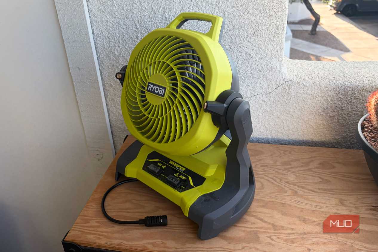 The Ryobi bucket top misting fan on a tool chest.