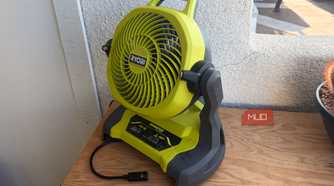 The Ryobi bucket top misting fan on a tool chest.