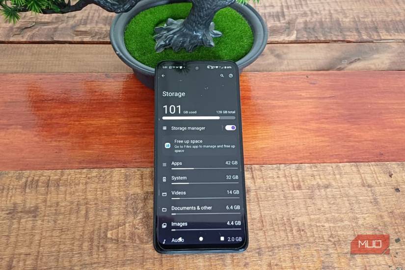 Android Storage on a Samsung Galaxy A34 showing 101GB of 128GB used, with apps, system, videos, documents, and images broken down by storage use