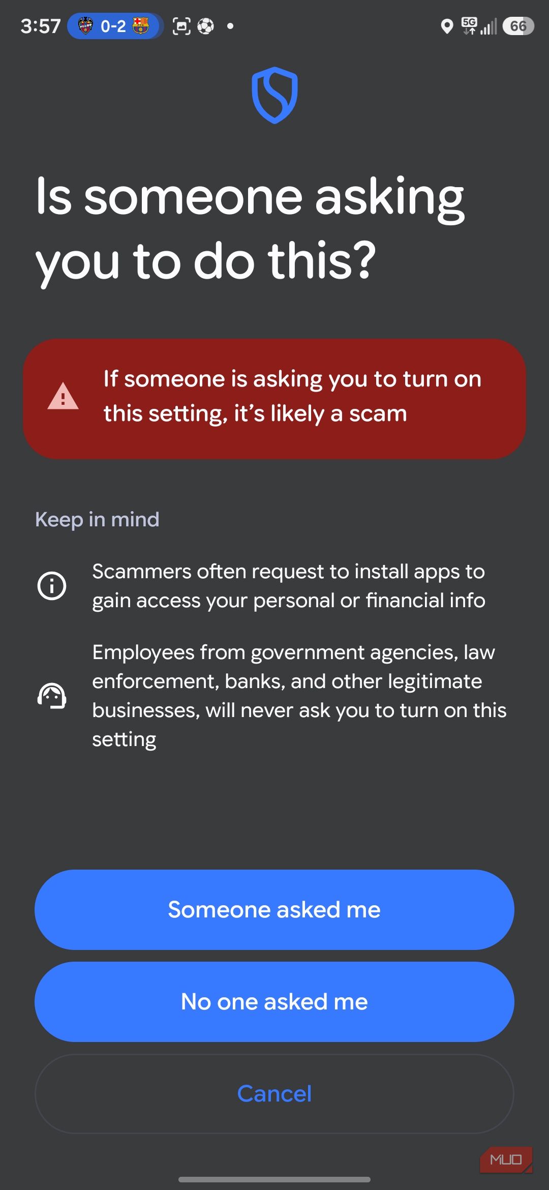 Smartphone screen warning about scam settings
