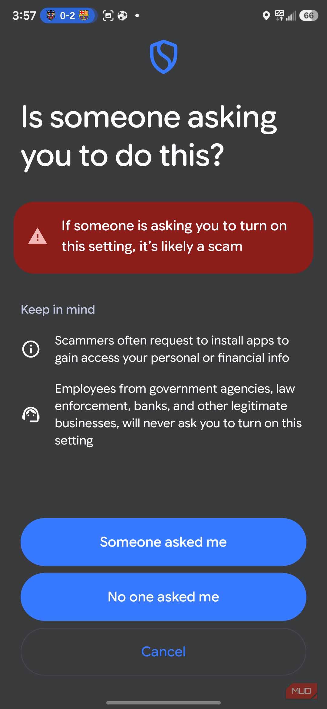 Smartphone screen warning about scam settings