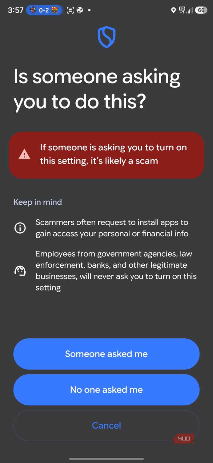 Smartphone screen warning about scam settings