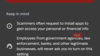 Smartphone screen warning about scam settings