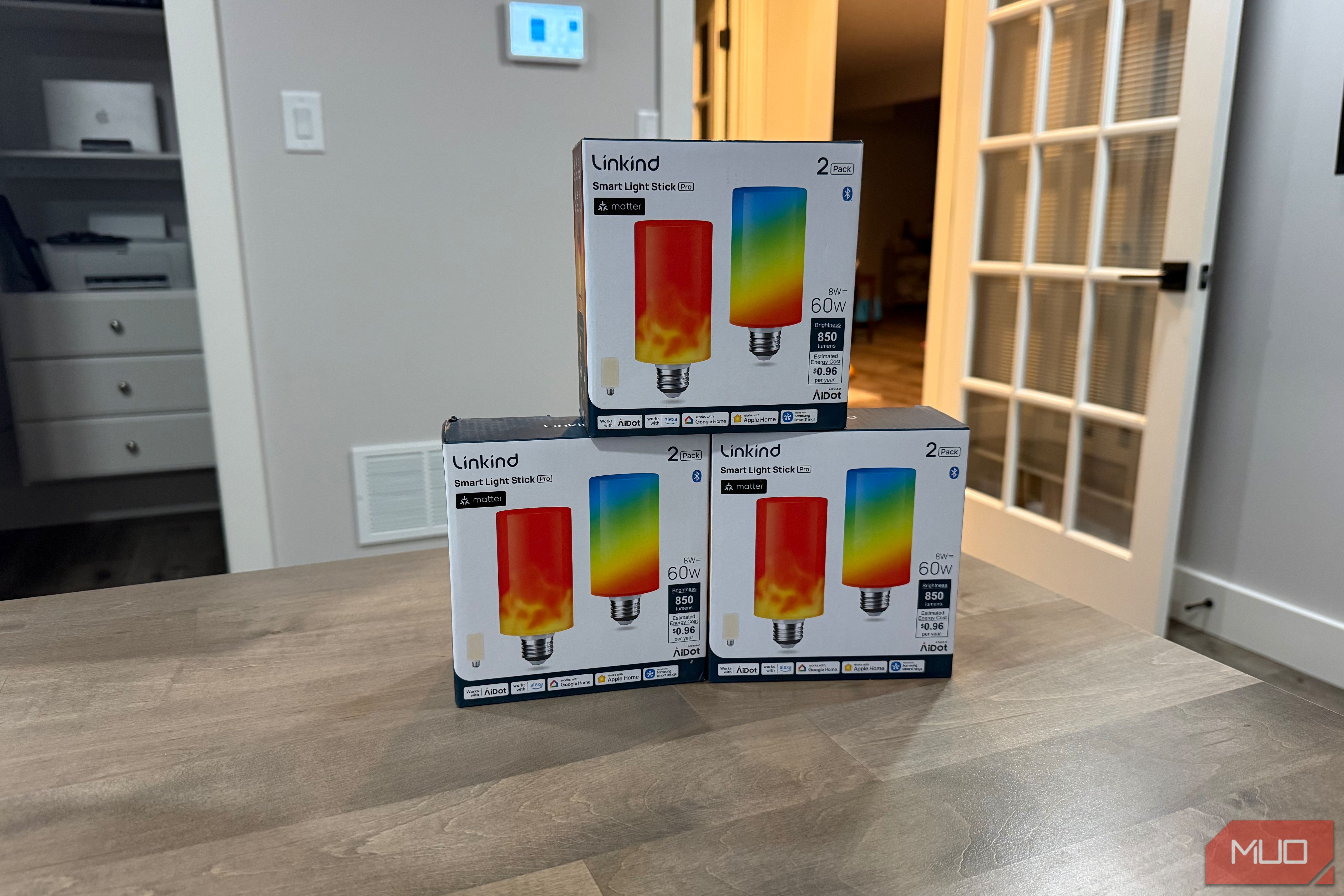 Three Linkind Smart Light Stick boxes stacked on a table