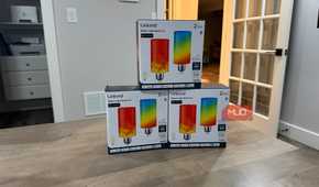 Three Linkind Smart Light Stick boxes stacked on a table