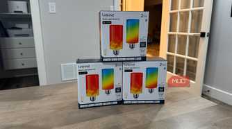 Three Linkind Smart Light Stick boxes stacked on a table