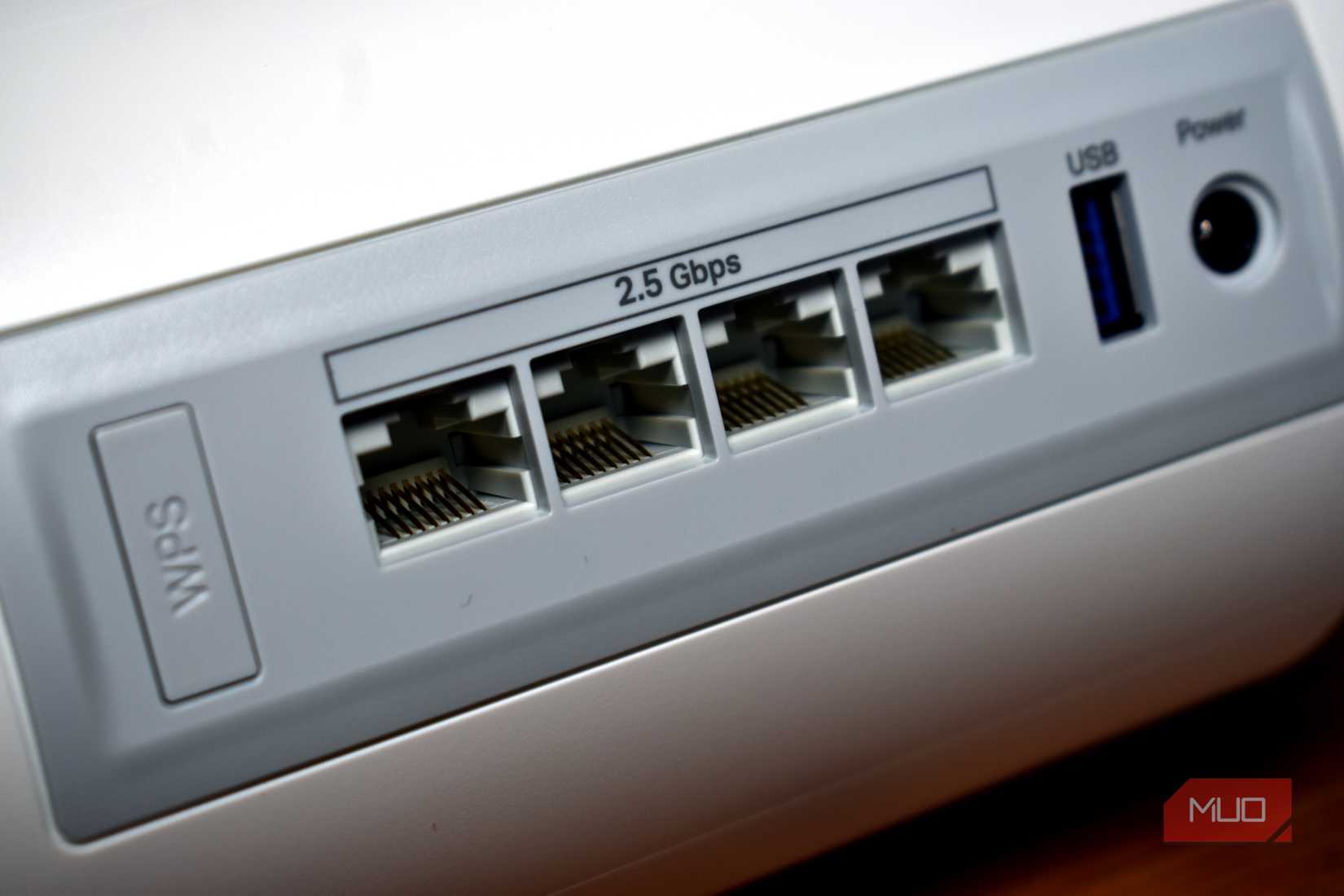 tp-link deco be65 wifi 7 router on table rear lan wan ports close up