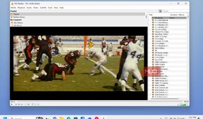 vlc media player displaying american football game footage with playlist